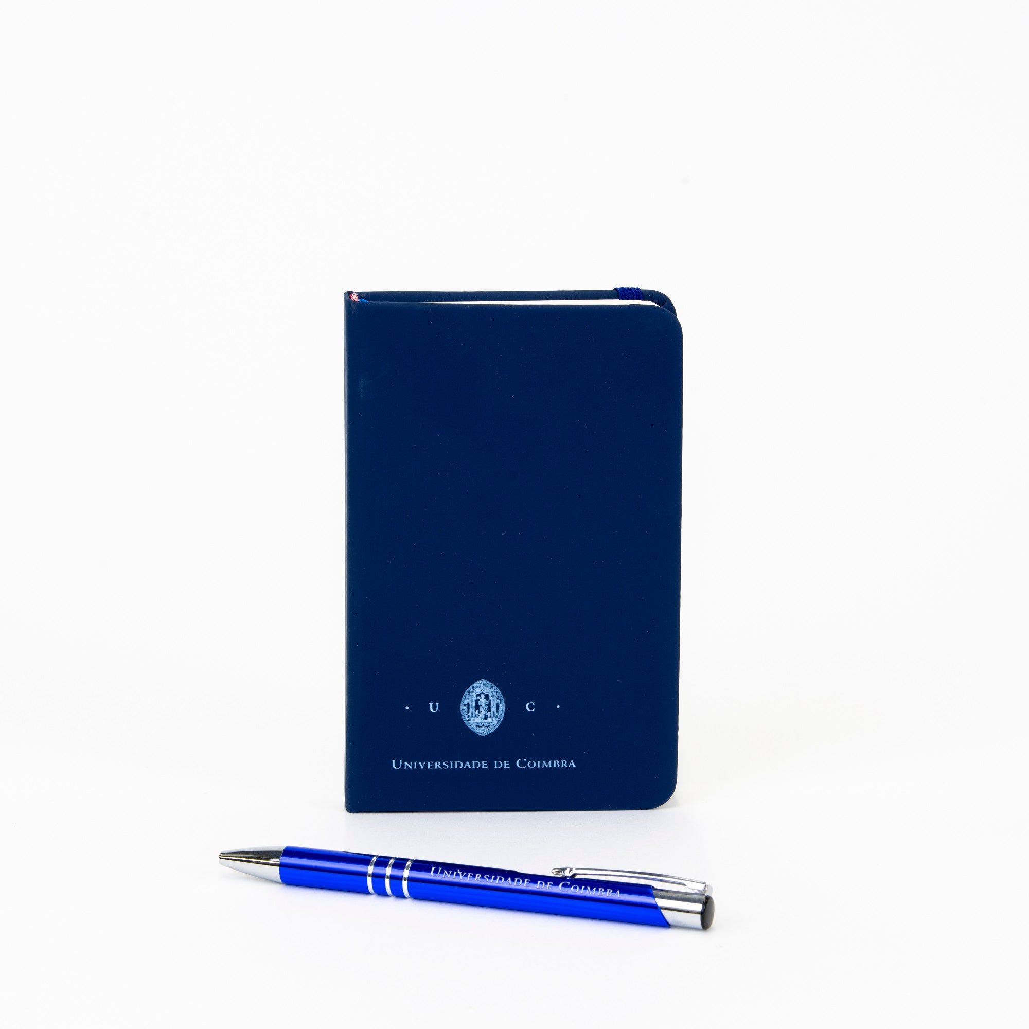 Bloco A6 Azul com insignia da Universidade de Coimbra. Esferográfica inlcuida.